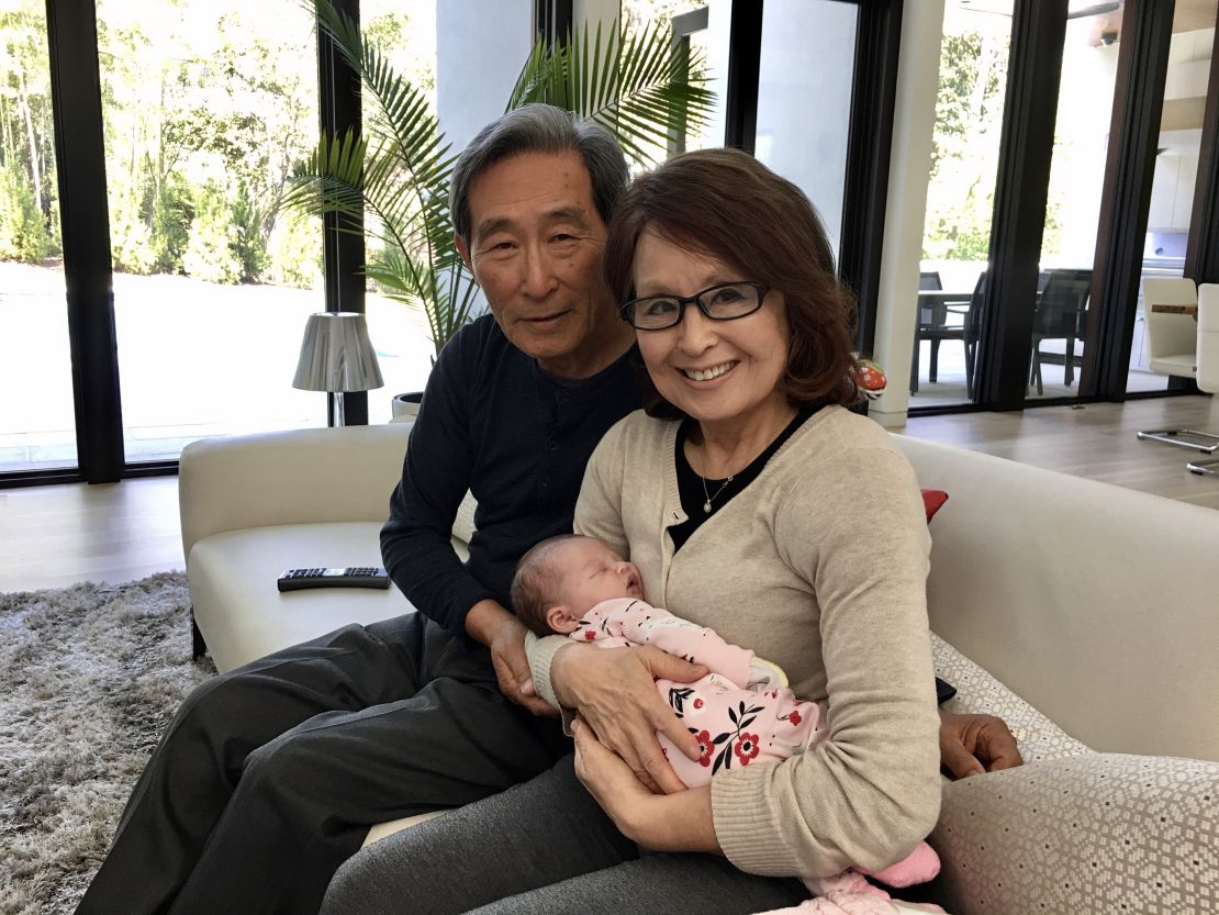 Amara Walker's parents with her daughter.