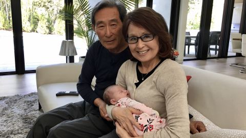 Amara Walker's parents with her daughter.