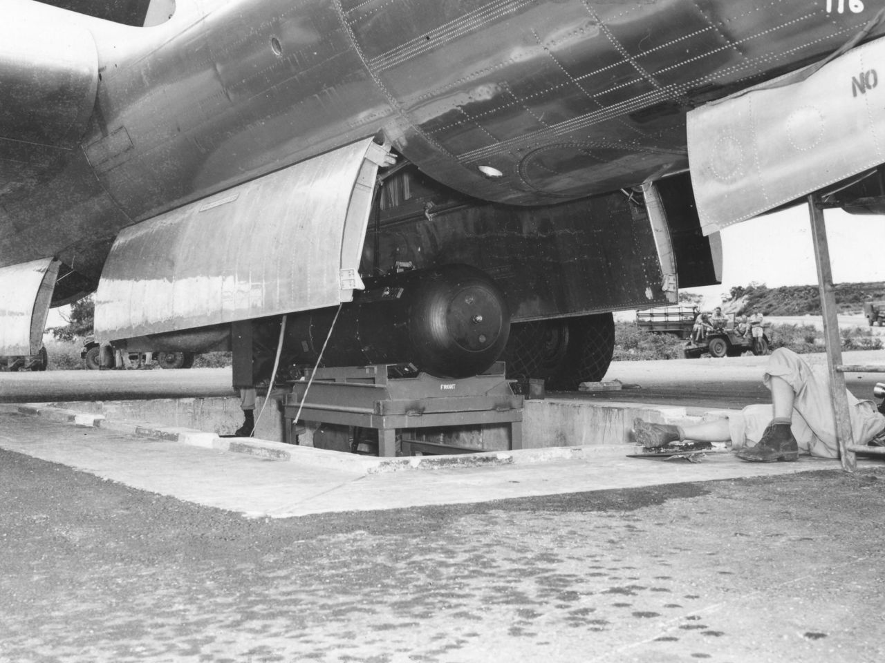 <strong>Little Boy: </strong>The atomic bomb, codenamed 'Little Boy,' is hoisted into the bomb bay of the Enola Gay on North Field, Tinian.