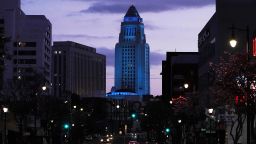 Los Angeles City Hall is illuminated in blue as part of the #LightItBlue campaign to salute front line health care workers amid the global coronavirus COVID-19 pandemic, Saturday, April 18, 2020.