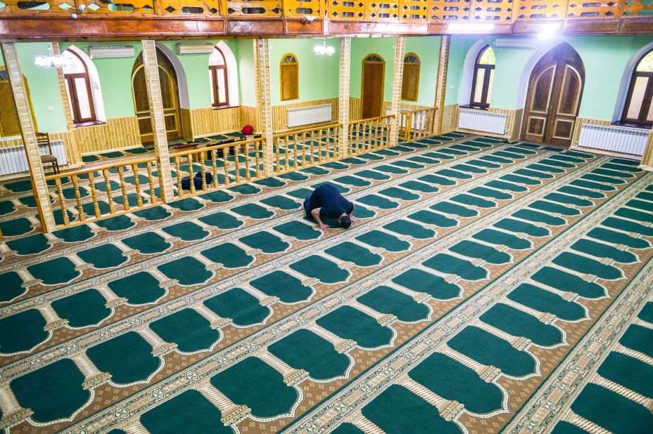 A man prays in an empty mosque in Qazax, Azerbaijan, on April 23.