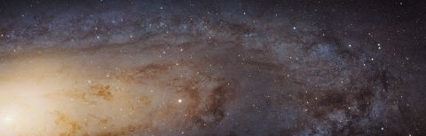 One of the closest neighbors to our own Milky Way, the Andromeda Galaxy, can be seen with the naked eye if you know where to look on a clear, dark night. In 2012, scientists using data from Hubble predicted Andromeda would collide with the Milky Way in about four billion years. Andromeda is 2.5 million light years from Earth.