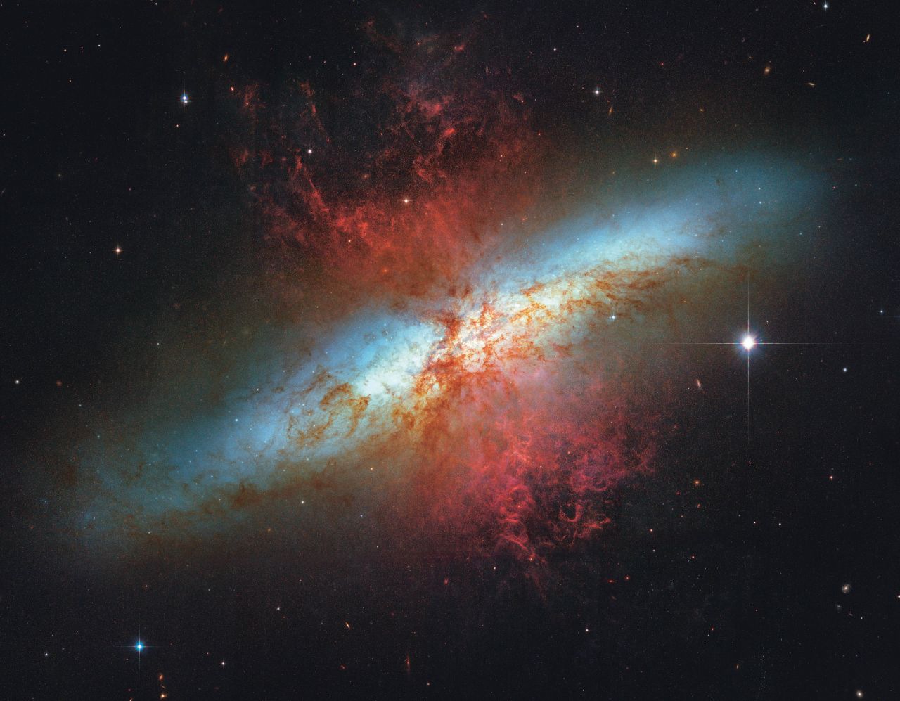 The Cigar Galaxy is 12 million light years away. It gets its name from its shape: From Earth it looks like an elongated elliptical disc.