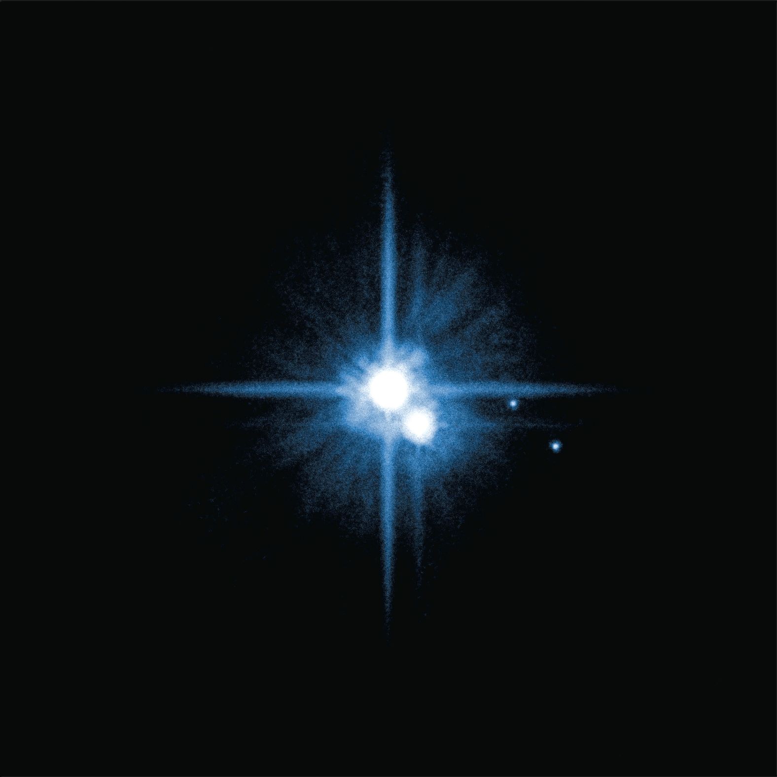 Hubble discovered four of Pluto's five moons. In 2005: Nix and Hydra were found. Hubble discovered Kerberos in 2011 and Styx in 2012. The new discoveries joined Pluto's large moon, Charon, which was discovered in 1978. Styx was found by scientists using Hubble to search for potential hazards for the New Horizons spacecraft which flew by Pluto in July 2015. Pluto is about 2.9 billion miles from Earth.