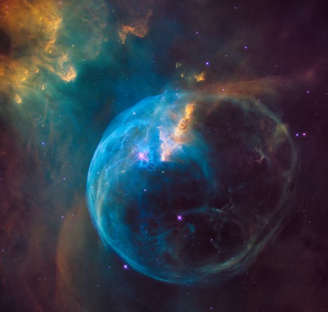 Even stars like to blow bubbles. This 2016 image shares Hubble's view of the Bubble Nebula, where a superhot, massive star is blowing a giant bubble into space. The nebula is 7 light-years across. 