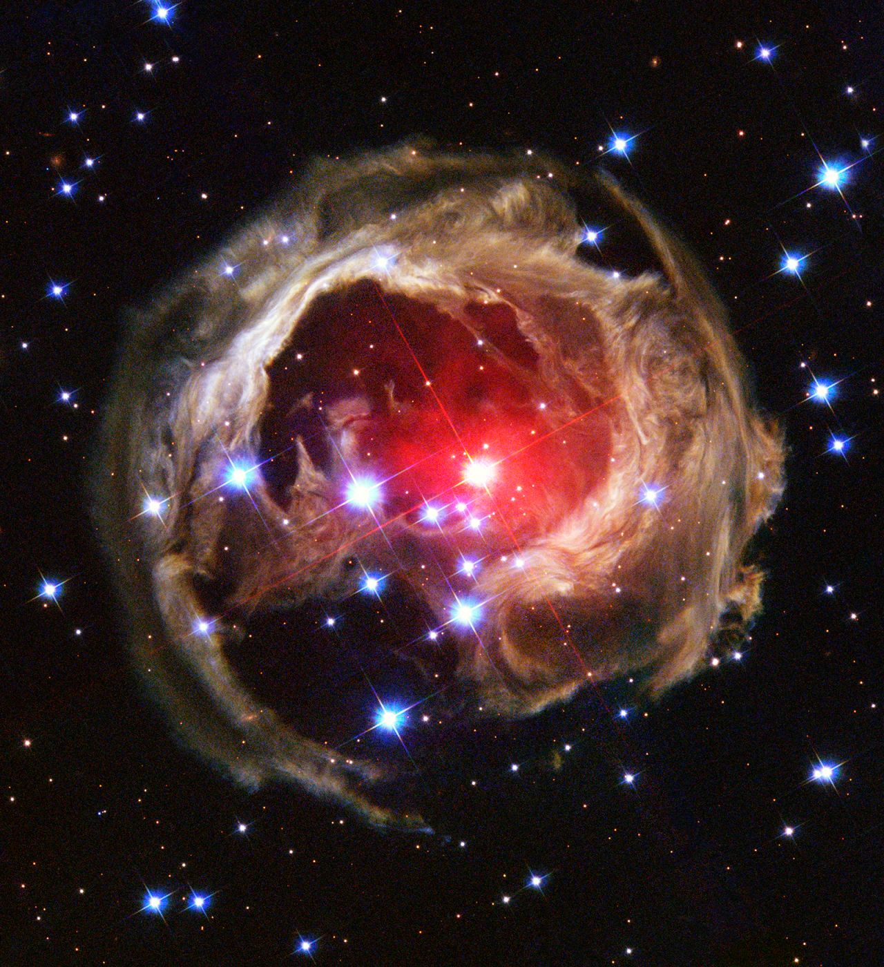 Hubble captured this view of an expanding light halo around the star V838 Monocerotis in 2004. 