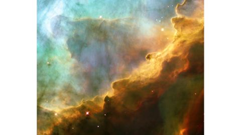 Hubble captured this view of star formation in the Swan Nebula.