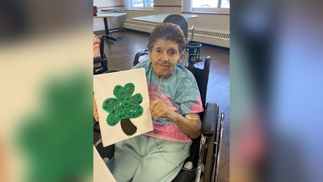 Fryz's mother Loretta posed with a shamrock last month.