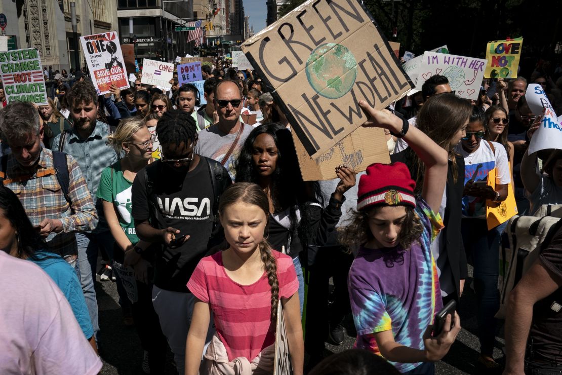 Greta Thunberg, center, leads young activists and supporters in New York as they demand action on the climate crisis.