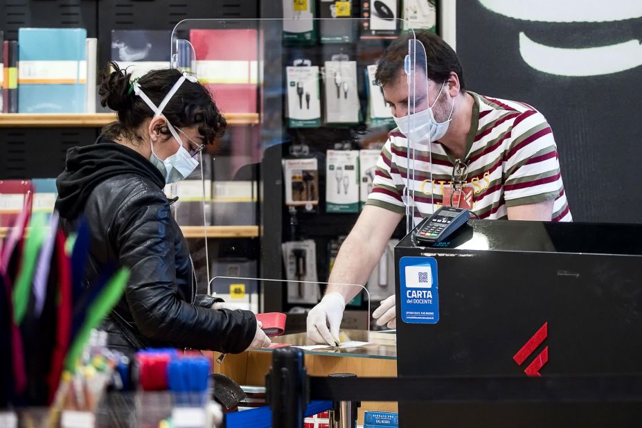 A woman shops at a bookstore in Rome on April 20.