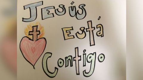 A note drawn by hospital chaplain Claire Bohman for a Covid-19 patient reads "Jesus is with you."