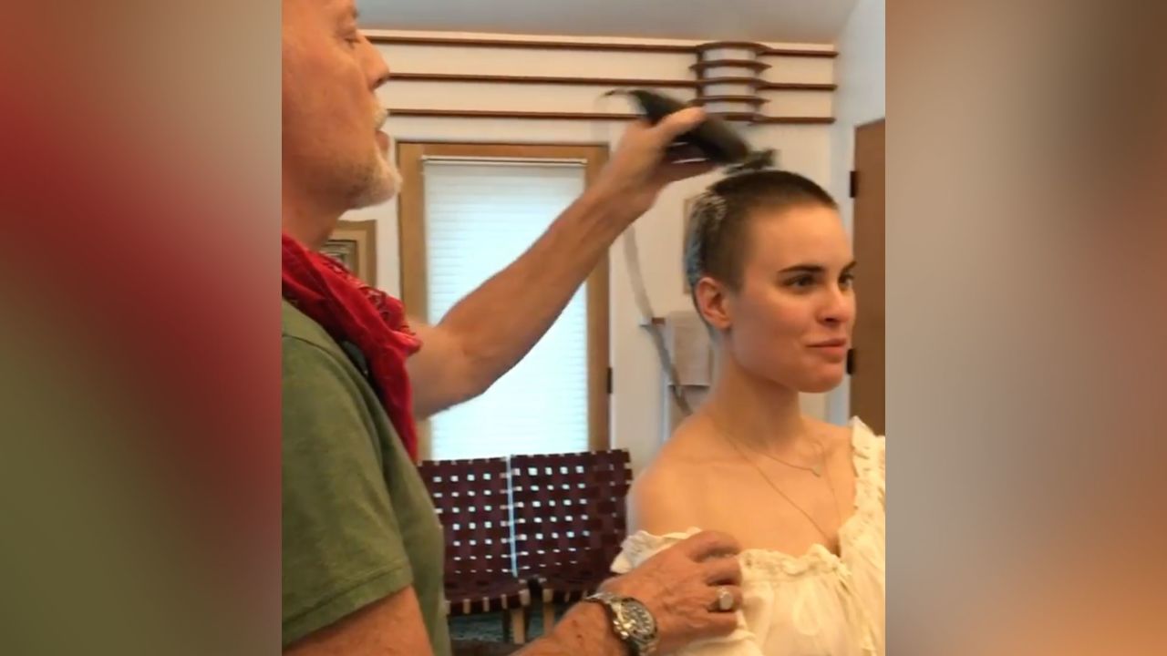 Bruce Willis shaves daughter Tallulah's hair while in quarantine. 