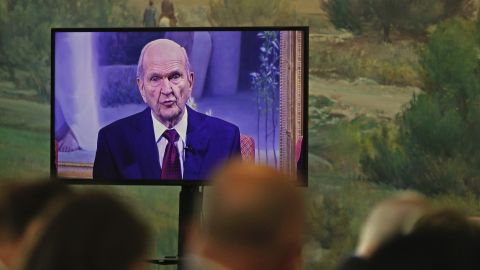 Members watch as Russell M. Nelson President of the Church of Jesus Christ of Latter -Day Saints, makes an announcement in January 2017. Nelson said this April that the Church will open a temple in Shanghai.