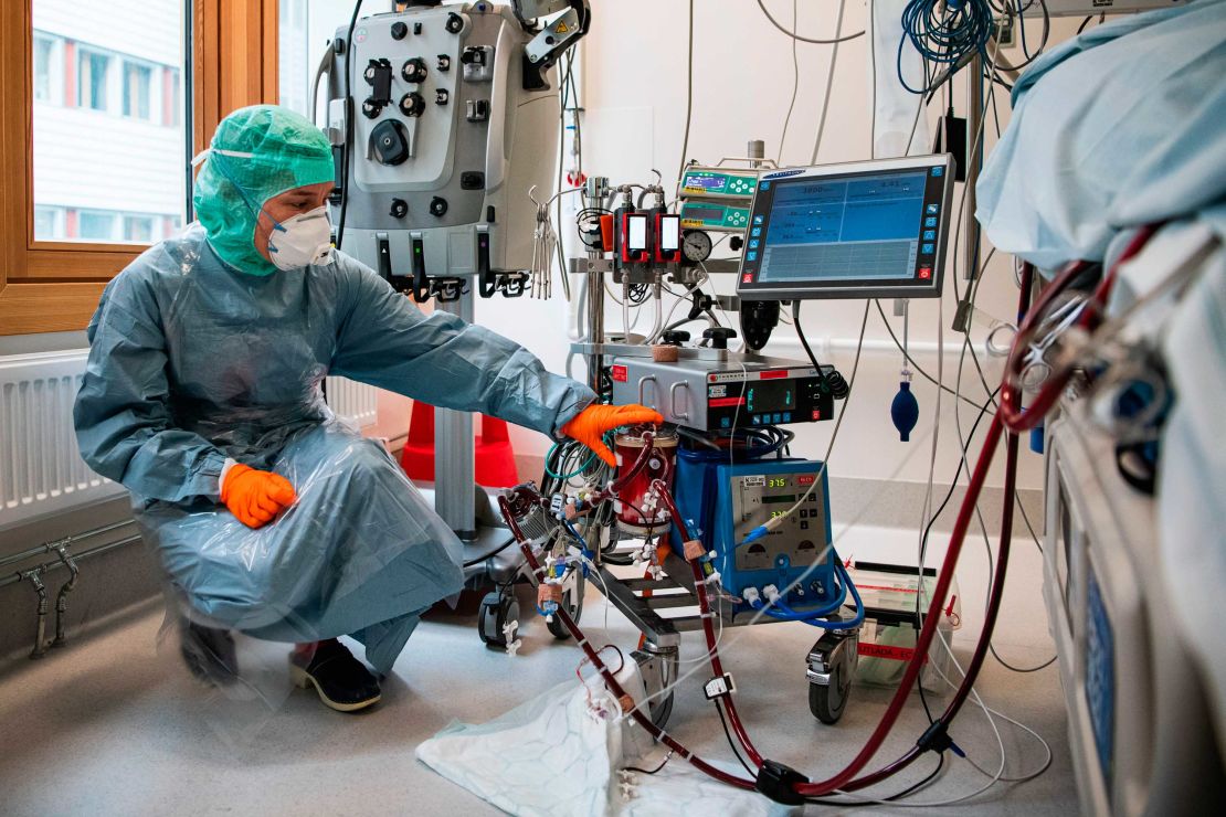 A nurse checks on a Covid-19 patient in the Extracorporeal Membrane Oxygenation (ECMO) department of the Karolinska Hospital in Solna, near Stockholm, Sweden, on April 19.