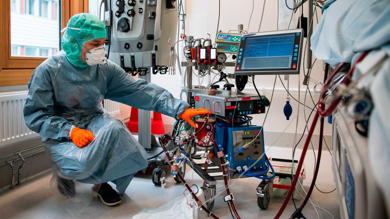 A nurse checks on a Covid-19 patient in the extracorporeal membrane oxygenation (ECMO) department of the Karolinska University Hospital in Solna, near Stockholm, Sweden.