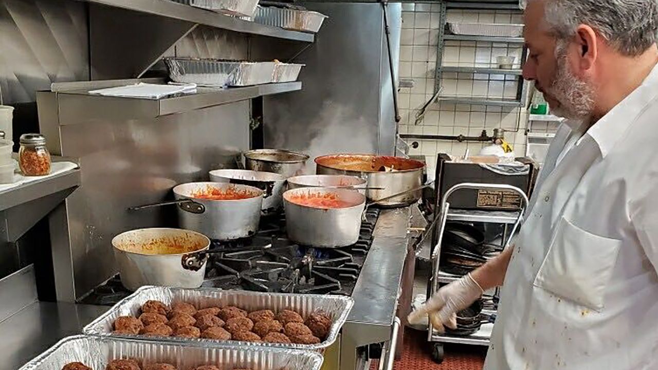 Rao's Executive Chef Dino Gatto working on a batch of the restaurant's famous meatballs.