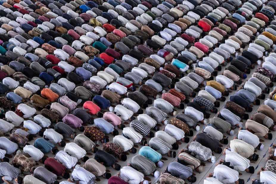 Muslim men attend a Friday prayer in Lhokseumawe, Indonesia.
