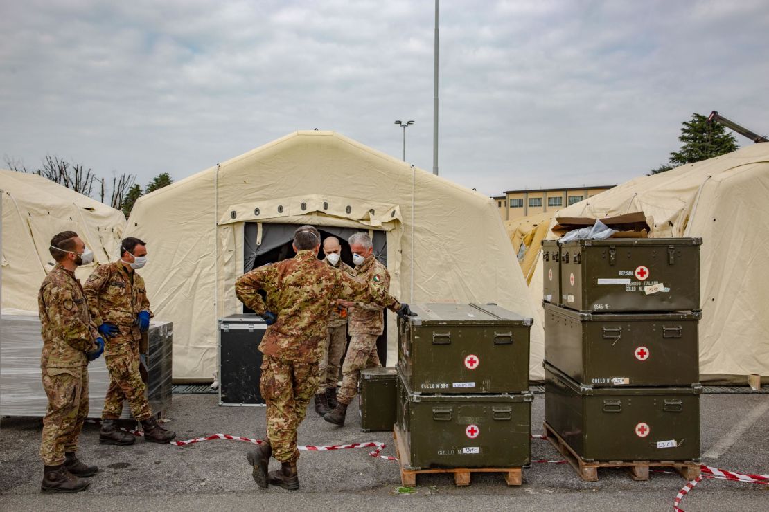 Italian soldiers gather at a military field hospital outside of the main Crema hospital on March 22.
