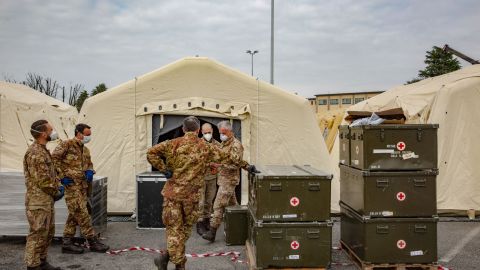 Italian soldiers gather at a military field hospital outside of the main Crema hospital on March 22.