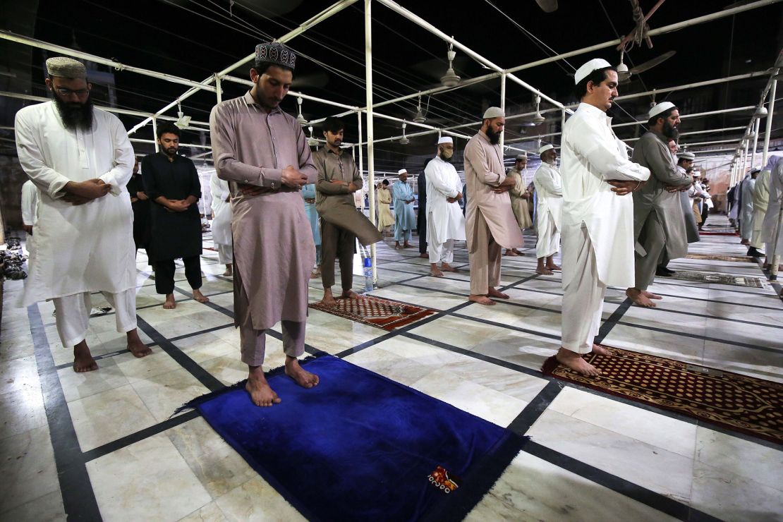 Muslims offer special taraveeh prayers during the Muslim holy month of Ramadan in Peshawar, Pakistan, on April 24, 2020. 