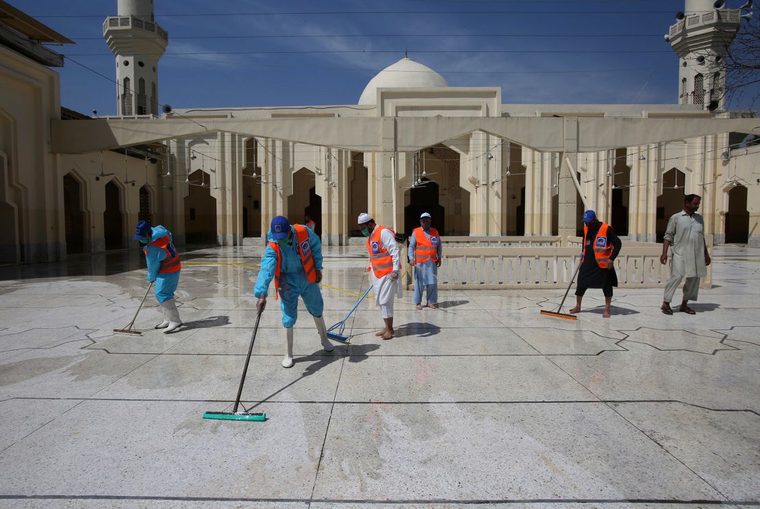 Volunteers disinfect a mosque ahead of the Muslim fasting month of Ramadan, in Peshawar, Pakistan, on April 24, 2020. 