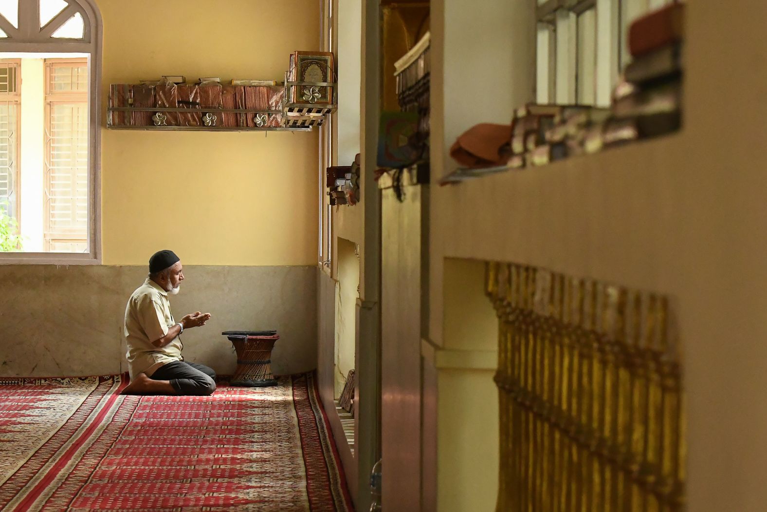 A man attends prayers at the Jame Mosque in Kathmandu, Nepal, on April 25.