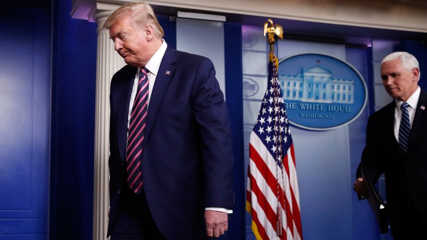President Donald Trump and Vice President Mike Pence leave at the end of a briefing about the coronavirus in the James Brady Press Briefing Room of the White House, Friday, April 24, 2020, in Washington.