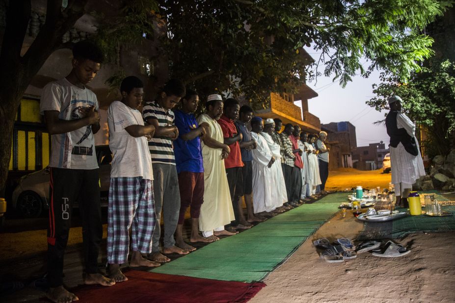 Muslims pray after breaking their fast in Khartoum, Sudan, on April 25.