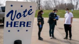 Poll workers during curbside voting on April 7, 2020 in Madison, Wisconsin. Residents in Wisconsin went to the polls a day after the U.S. Supreme Court voted against an extension of the absentee ballot deadline in the state. Because of the coronavirus, the number of polling places was drastically reduced. 