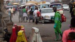 A city worker disinfects a market as a preventive measure against the spreading of COVID-19 Coronavirus in Accra on March 23, 2020. - African countries have been among the last to be hit by the global COVID-19 coronavirus epidemic but as cases rise, many nations are now taking strict measures to block the deadly illness. (Photo by Nipah Dennis / AFP) (Photo by NIPAH DENNIS/AFP via Getty Images)