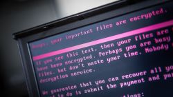 A laptop displays a message after being infected by a ransomware as part of a worldwide cyberattack on June 27, 2017 in Geldrop. 
The unprecedented global ransomware cyberattack has hit more than 200,000 victims in more than 150 countries, Europol executive director Rob Wainwright said May 14, 2017. Britain's state-run National Health Service was affected by the attack. / AFP PHOTO / ANP / Rob Engelaar / Netherlands OUT        (Photo credit should read ROB ENGELAAR/AFP via Getty Images)