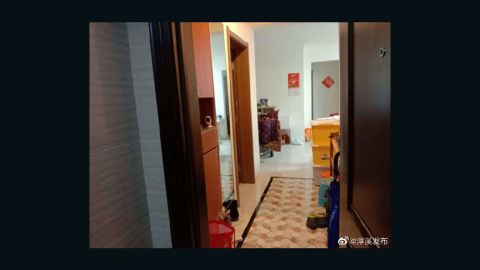 A photo released by the Chunxi government showed a camera standing on a cabinet inside an apartment. 