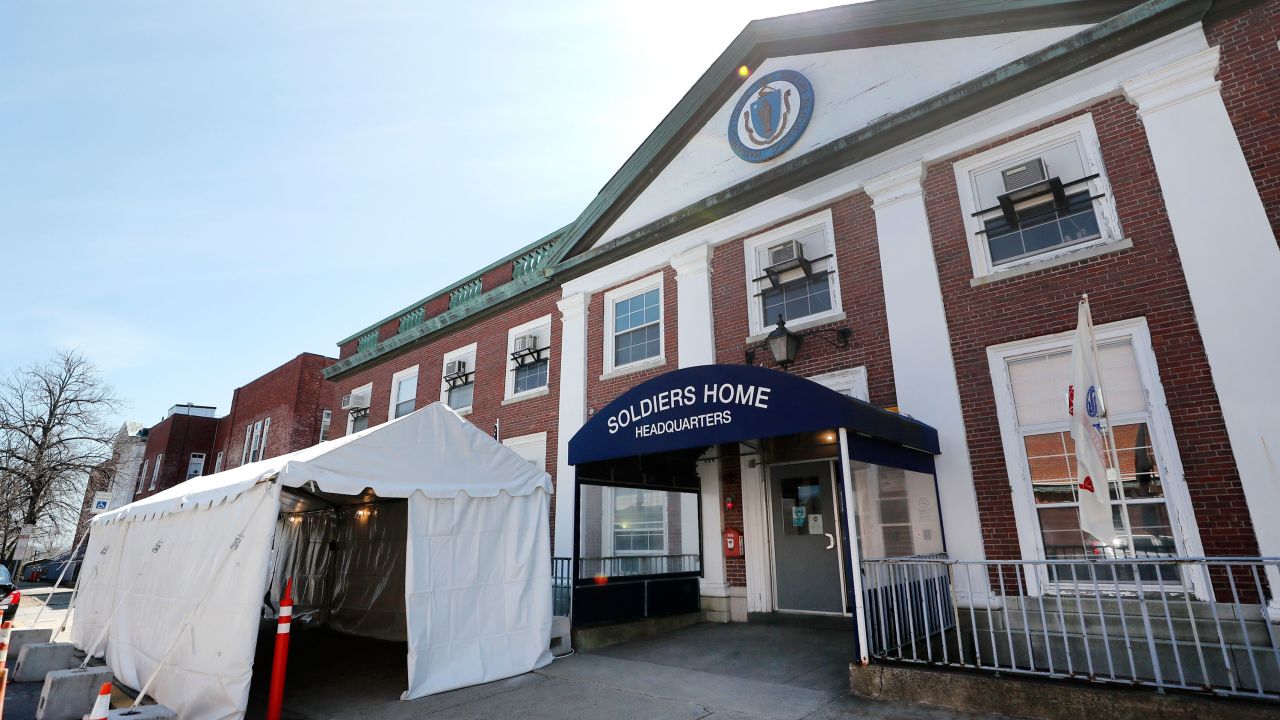 A tent sits idle beside the entrance to the Soldiers' Home in Chelsea.