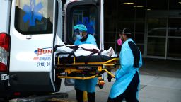 A patient is transferred from Elmhurst Hospital  in New York, US, on April 25, 2020. Elmhurst Hospital Trauma Center In Queens Borough of New York City Continues Receiving Covid-19 Patients. While hospitals in New York City have been overwhelmed by the number of Covid -19 cases, currently they are experiencing a downturn in daily patient intakes as the statistical curve has flattened and it is in a downturn. New York City has reached over 17,000 deaths and over 57,000 hospitalizations were reported in the state of NY to date.