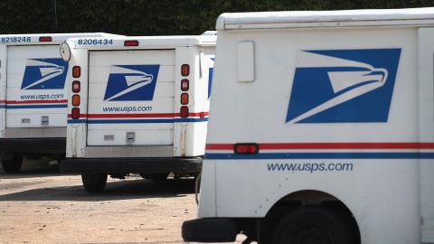 United States Postal Service (USPS) trucks are parked at a postal facility on August 15, 2019 in Chicago.