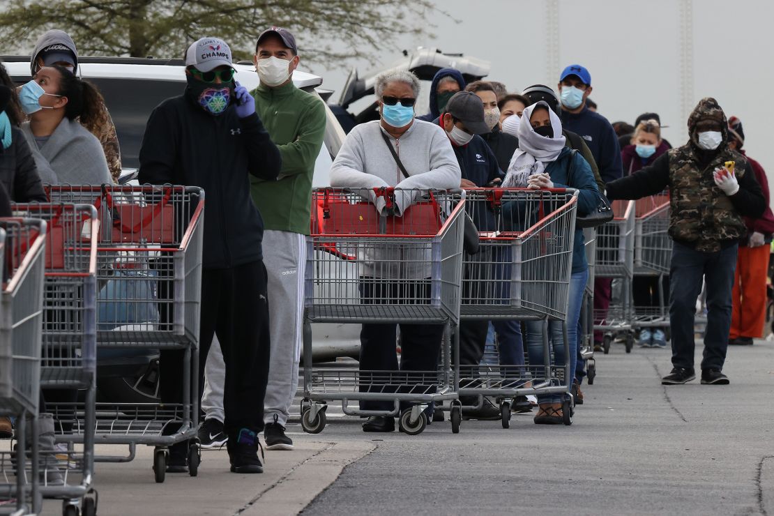Customers wear face masks outside a Costco Wholesale store in Maryland.