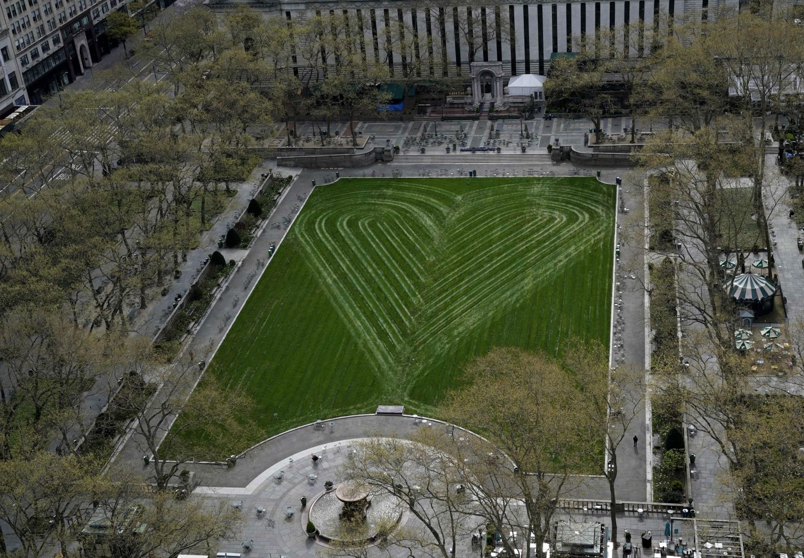 In a tribute to health-care workers, first responders and essential workers, the Bryant Park Corporation created a heart on its newly seeded lawn in New York on April 22.