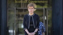 EDINBURGH, UNITED KINGDOM - APRIL 28: First Minister Nicola Sturgeon stands outside St Andrew's House to observe a minute's silence in tribute to the NHS staff and key workers who have died during the coronavirus outbreak on April 28, 2020 in Edinburgh, United Kingdom. The moment of silence, commemorating the key workers who have died during the Covid-19 pandemic, was timed to coincide with International Workers' Memorial Day. At least 90 NHS workers are reported to have died in the last month, in addition to transport employees and other key workers. (Photo by Jane Barlow-WPA Pool/Getty Images)
