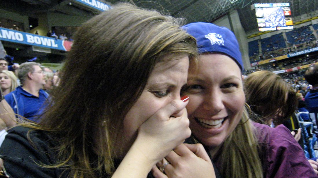 <strong>Remember the Alamo</strong>: Erin Collier (right) comforts the author during a crushing loss to Missouri at the 2008 Alamo Bowl in San Antonio, TX.