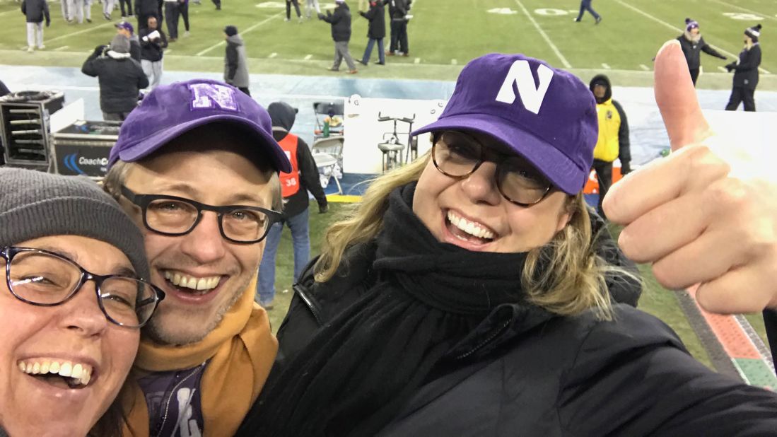<strong>Victory dance</strong>: Katie Cour (left), Peter Dangerfield and the author celebrating Northwestern's win at the 2017 Music City Bowl in Nashville, TN.