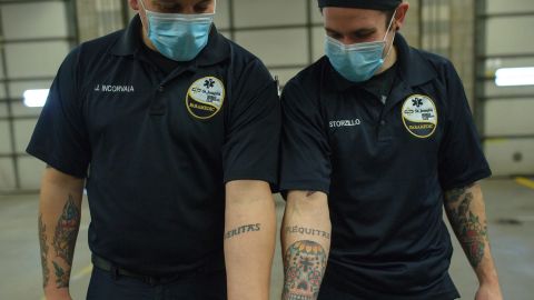 In between calls, Incorvaia and Storzillo show off their matching tattoos.