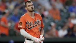 Baltimore Orioles' Trey Mancini reacts after striking out to Toronto Blue Jays starting pitcher Thomas Pannone during the third inning of a baseball game, Saturday, Aug. 3, 2019, in Baltimore. (AP Photo/Julio Cortez)