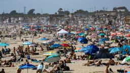 NEWPORT BEACH, CA - APRIL 25: Large crowds gather near the Newport Beach Pier in Newport Beach on Saturday, April 25, 2020 to cool off during the hot weather despite the coronavirus pandemic. (Photo by Mindy Schauer/MediaNews Group/Orange County Register via Getty Images)