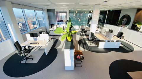 Commercial real estate firm Cushman & Wakefield has built a prototype called the "Six Feet Office," which encourages workers to continue social distancing when they return to the office.