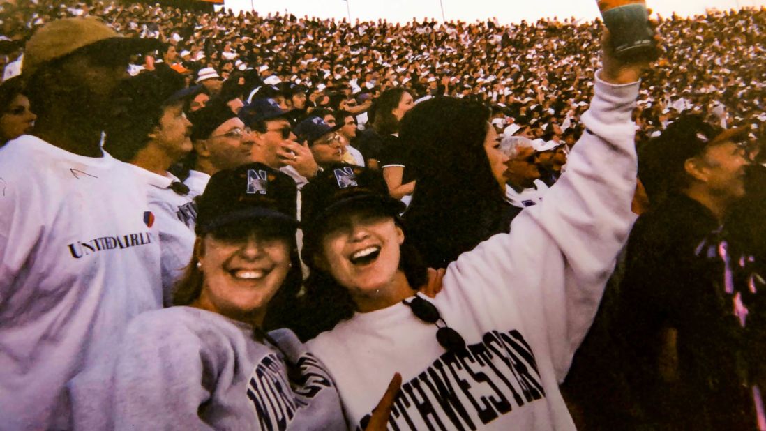 <strong>Go Cats!</strong> The author (left) and her friend, Julie King, can't keep it in at the Rose Bowl on New Year's Day, 1996.