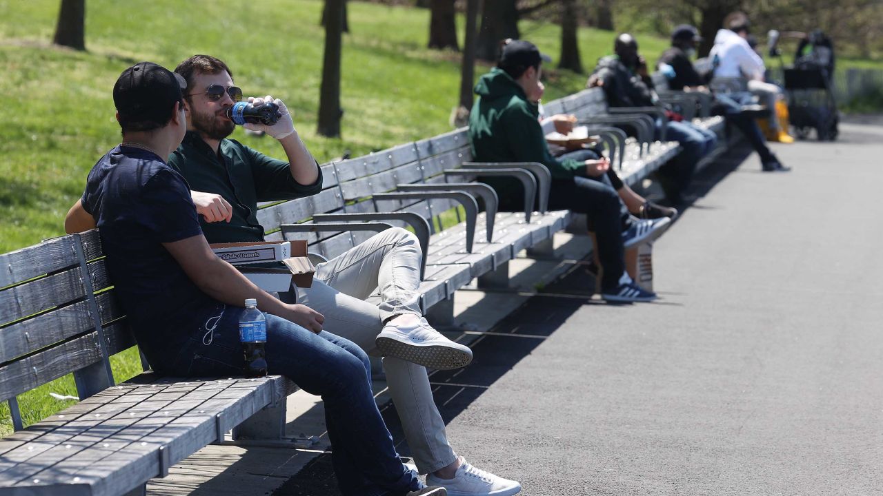 BROOKLYN, NEW YORK  - APRIL 28:  People practice social distancing amidst the coronavirus pandemic at Brooklyn Bridge Park on April 28, 2020 in the Brooklyn Borough of New York City.  The World Health Organization declared coronavirus (COVID-19) a global pandemic on March 11th.  (Photo by Al Bello/Getty Images)