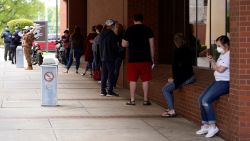 People who lost their jobs wait in line to file for unemployment following an outbreak of the coronavirus disease (COVID-19), at an Arkansas Workforce Center in Fort Smith, Arkansas, U.S. April 6, 2020. Photo by Nick Oxford/Reuters