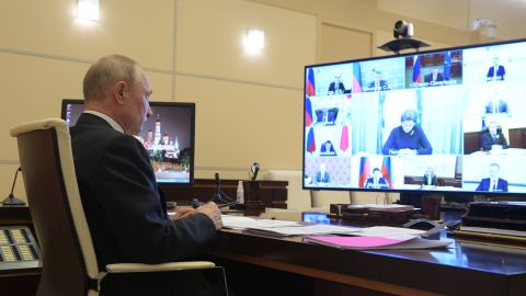 Russian President Vladimir Putin chairs a video conference meeting with heads of Russia's regions over the coronavirus situation on Tuesday.