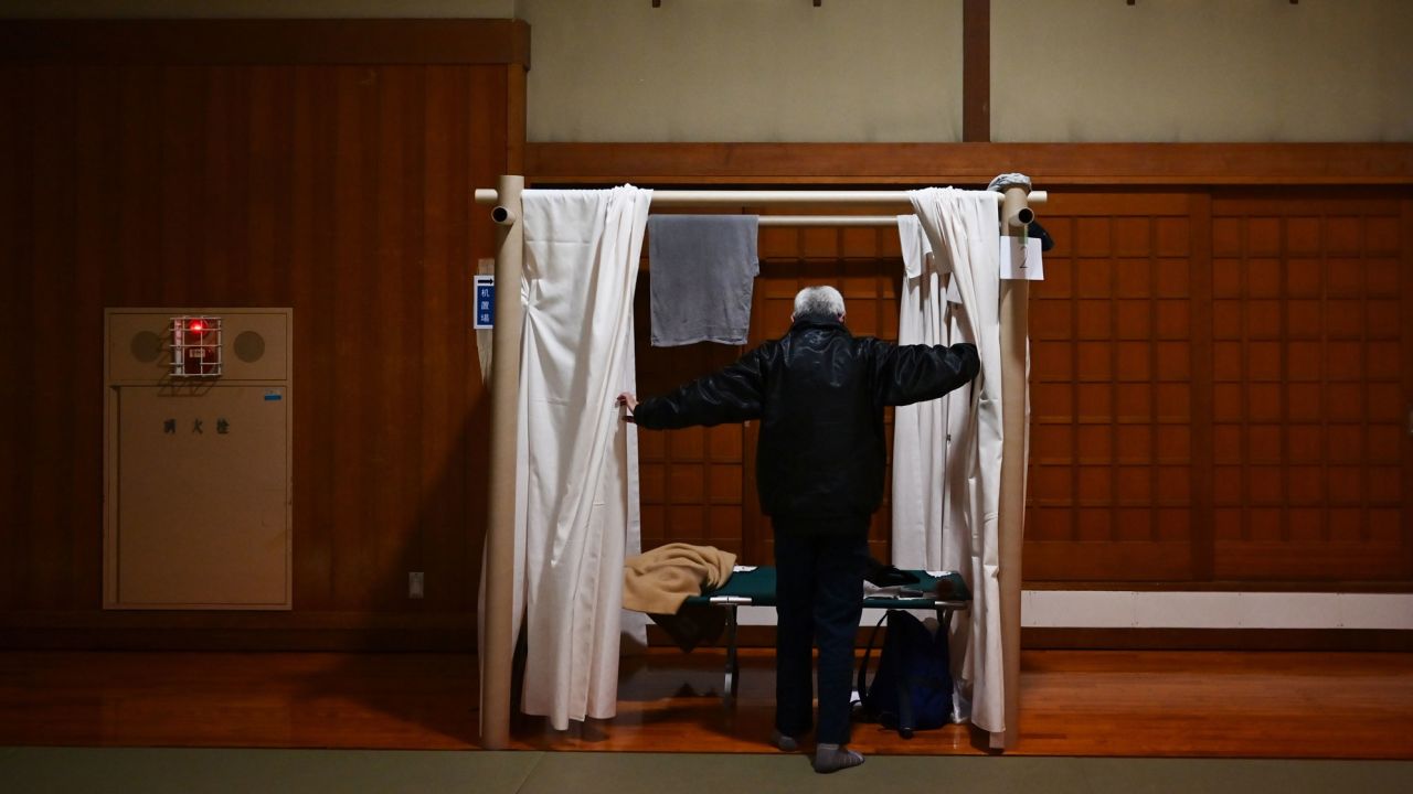 Katsuya Asao, 54, prepares to rest at a shelter provided by Kanagawa prefecture for those who used to stay at internet cafes, which were asked to close due to the COVID-19 coronavirus outbreak state of emergency.