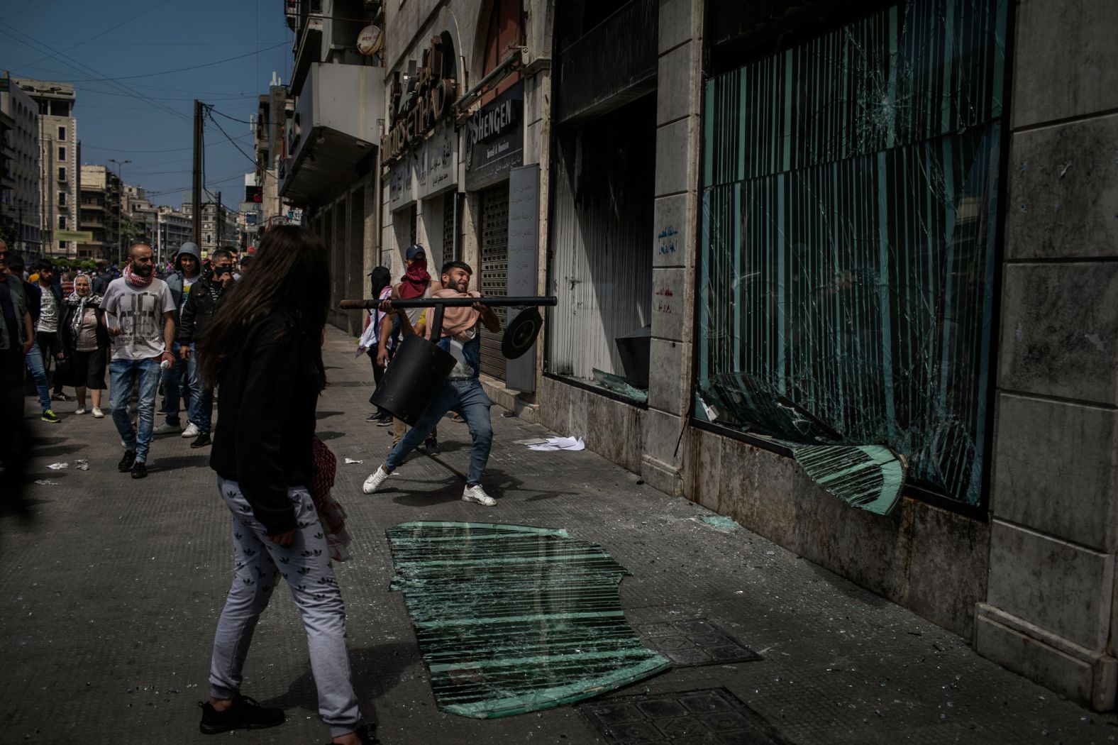 Protesters in Tripoli set banks on fire and vandalized their storefronts. The army responded with tear gas and rubber bullets.